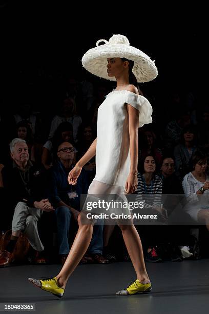 Model showcases designs by Victorio & Lucchino on the runway at Victorio & Lucchino show during Mercedes Benz Fashion Week Madrid Spring/Summer 2014...