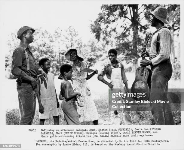 Actors Paul Winfield, Eric Hooks and Cicely Tyson in a scene from the movie 'Sounder', 1972.