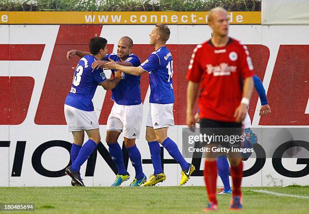 Sofian Chahed of Lotte celebrates after scoring his team's second goal with team mates during the Regionalliga West match between Sportfreunde Lotte...