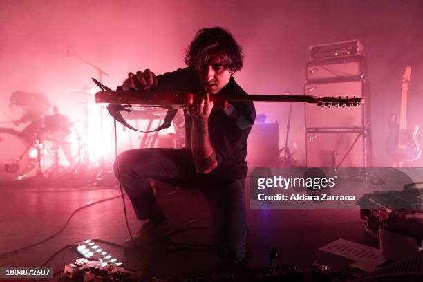 Munaf Rayani of Explosions In The Sky performs on stage at La Riviera on November 20, 2023 in Madrid, Spain.