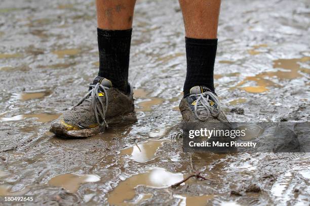 University of Colorado student Dylan Gebbia-Richards stands in the mud along Boulder Creek September 13, 2013 in Boulder, Colorado. Heavy rains for...