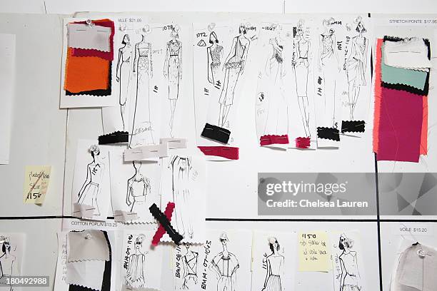 Skeches by designer Bibhu Mohapatra and fabric swatches pinned to his studio wall on September 5 one week prior to his runway show at Mercedes-Benz...