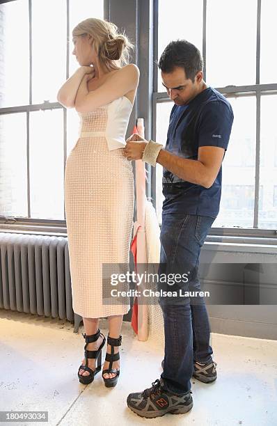 Being fitted on a model by designer Bibhu Mohapatra in his studio on September 5 one week prior to his runway show at Mercedes-Benz Fashion Week...