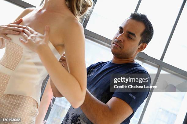 Being fitted on a model by designer Bibhu Mohapatra in his studio on September 5 one week prior to his runway show at Mercedes-Benz Fashion Week...