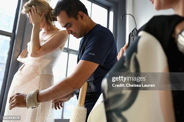 Being fitted on a model by designer Bibhu Mohapatra in his studio on September 5 one week prior to his runway show at Mercedes-Benz Fashion Week...