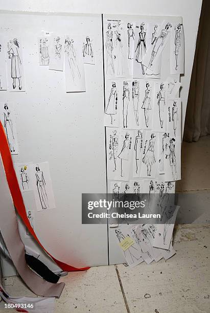 Skeches by designer Bibhu Mohapatra and fabric swatches pinned to his studio wall on September 5 one week prior to his runway show at Mercedes-Benz...