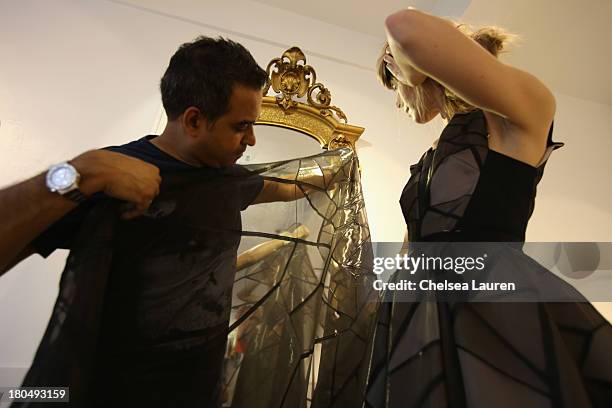Being fitted on a model by designer Bibhu Mohapatra in his studio on September 5 one week prior to his runway show at Mercedes-Benz Fashion Week...