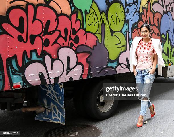 Nausheen Shah, writer and stylist working with MarieClaire.com and the New York Post, wears a Bibhu Mohapatra Spring 2014 coral baby tulip tulle top,...