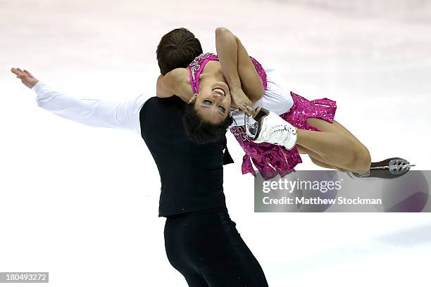 Logan Giulietti-Schmitt and Lynn Kriengkrairut compete in the short dance program during the US International Figure Skating Classic at the Salt Lake...