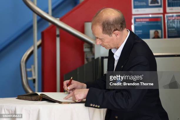 Prince Edward Duke of Edinburgh signs the visitors book at the PCYC City of Sydney-Woolloomooloo on November 21, 2023 in Sydney, Australia.