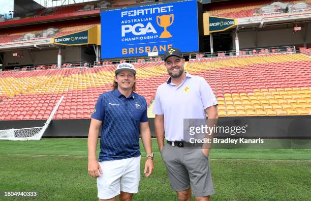 Cameron Smith and Marc Leishman pose for a photo after competing in a mowing challenge ahead of the 2023 Australian PGA Championship at Suncorp...
