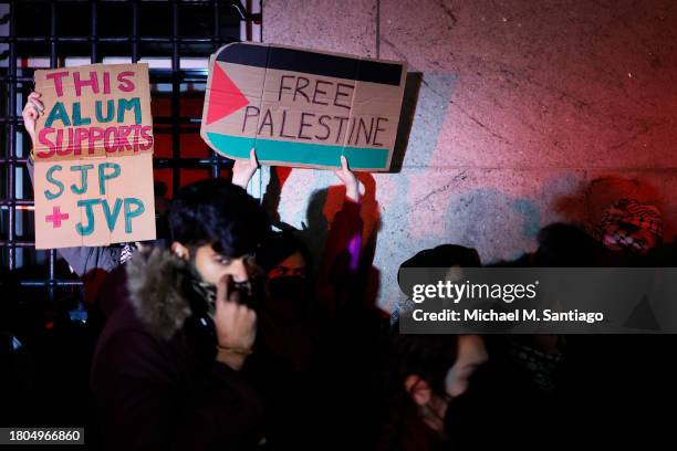 People gather to protest the banning of Students for Justice in Palestine and Jewish Voice for Peace at Columbia University on November 20, 2023 in...