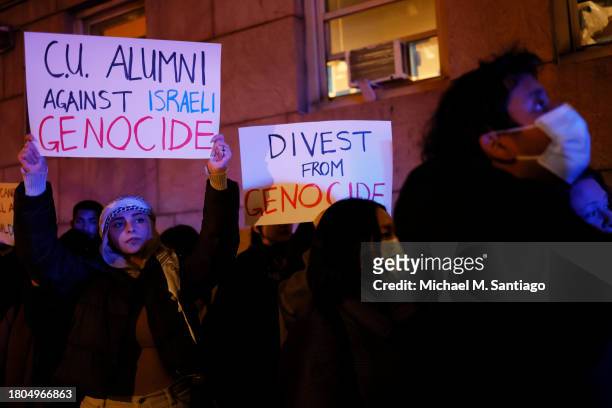 People gather to protest the banning of Students for Justice in Palestine and Jewish Voice for Peace at Columbia University on November 20, 2023 in...