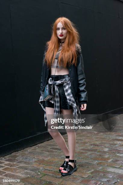 Fashion Blogger Olivia Harrison wears Choies shoes and bag, Eden skirt, Motel top, Unif bra top and a Calamity jacket on day 1 of London Fashion Week...