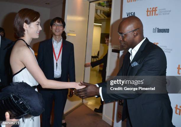 Actress Han Hyo-joo and TIFF Co-Director Cameron Bailey attend the "Cold Eyes" premiere during the 2013 Toronto International Film Festival at Roy...