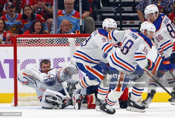 Goaltender Calvin Pickard of the Edmonton Oilers loses his mask during the third period against the Florida Panthers at Amerant Bank Arena on...