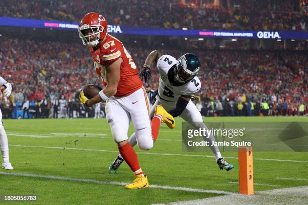 Travis Kelce of the Kansas City Chiefs gets past Darius Slay of the Philadelphia Eagles to score a touchdown in the first half at GEHA Field at...