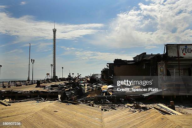 The scene of a massive fire that destroyed dozens of businesses is viewed along an iconic Jersey shore boardwalk on September 13, 2013 in Seaside...