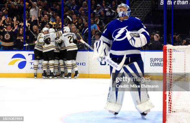 Charlie Coyle of the Boston Bruins celebrates a goal in the third period during a game against the Tampa Bay Lightning at Amalie Arena on November...