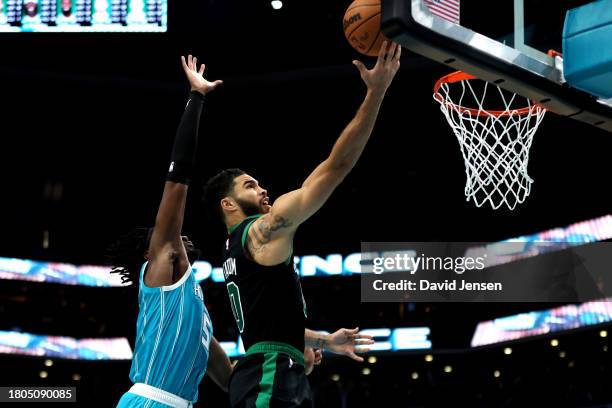 Mark Williams of the Charlotte Hornets defends a shot by Jayson Tatum of the Boston Celtics during the second half of an NBA game at Spectrum Center...