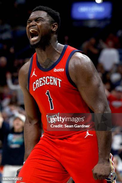 Zion Williamson of the New Orleans Pelicans reacts after dunking the ball during the fourth quarter of an NBA game against the Sacramento Kings at...