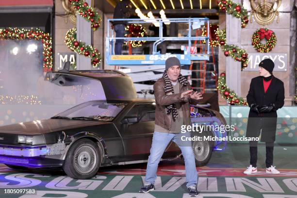 Roger Bart and Casey Likes perform "Back to the Future: The Musical" during day one of 97th Macy's Thanksgiving Day Parade rehearsals at Macy's...