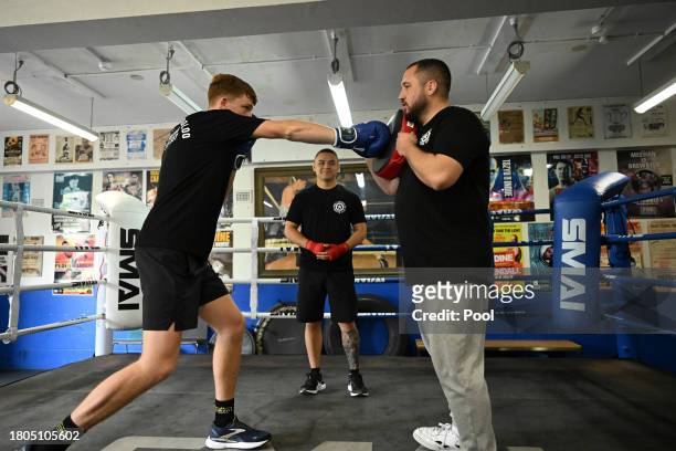 Head coach Adam Thompson trains 21 year old Marlon Sevehon from the Youth Boxing Program during a demonstration at the Police Citizens Youth Centre...
