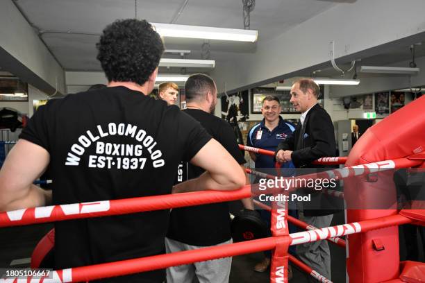 Prince Edward, Duke of Edinburgh, speaks with boxers and representatives from the Youth Boxing Program at the Police Citizens Youth Centre in...