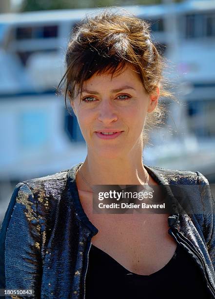 Actress Anne Caillon poses during the photocall of 'Dos Au Mur' at 15th Festival of TV Fiction on September 13, 2013 in La Rochelle, France.