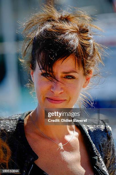 Actress Anne Caillon poses during the photocall of 'Dos Au Mur' at 15th Festival of TV Fiction on September 13, 2013 in La Rochelle, France.