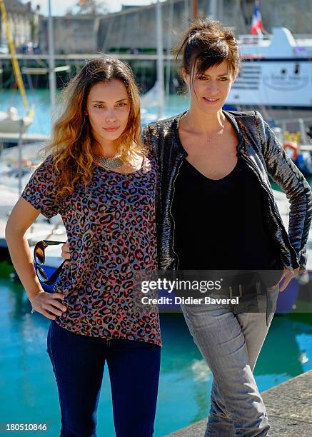 Actresses Anne Caillon and Lise Schreiber pose during the photocall of 'Dos Au Mur' at 15th Festival of TV Fiction on September 13, 2013 in La...