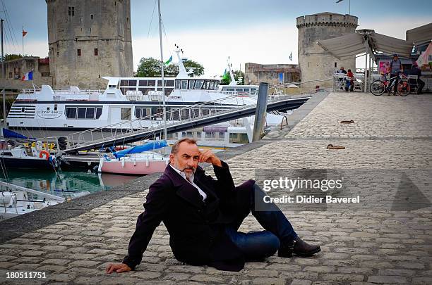 Antoine Dulery poses during the photocall of 'Vaugand' at 15th Festival of TV Fiction on September 13, 2013 in La Rochelle, France.