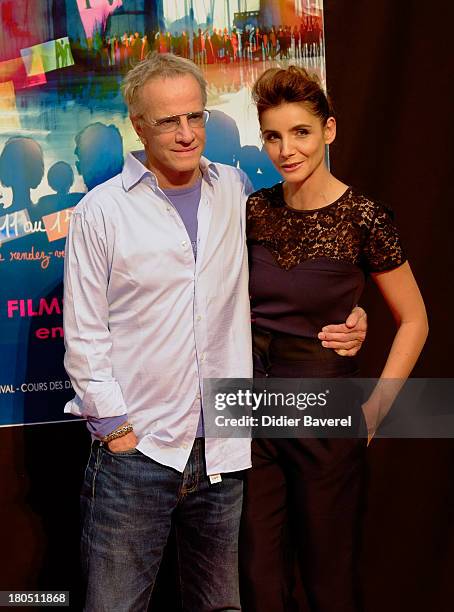 Christophe Lambert and Clotilde Coureau pose during the photocall of 'La Source' at 15th Festival of TV Fiction on September 13, 2013 in La Rochelle,...