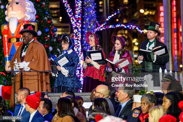 Carolers in costumes perform during the Fox News 4th annual all-American Christmas Tree lighting at Fox News Channel Studios on November 20, 2023 in...