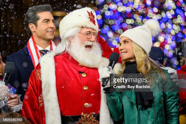 Jesse Watters with Santa Claus and Dana Perino as they host the Fox News 4th annual all-American Christmas Tree lighting at Fox News Channel Studios...