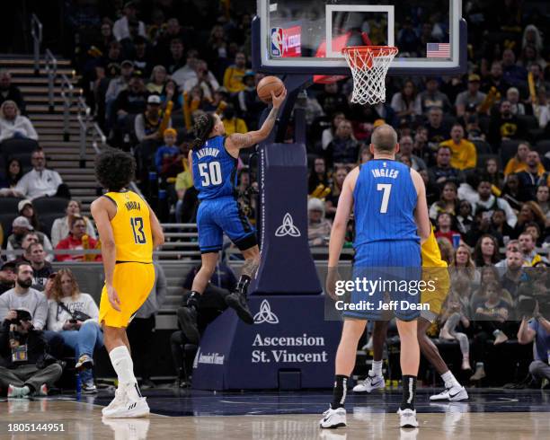 Cole Anthony of the Orlando Magic shoots against the Indiana Pacers at Gainbridge Fieldhouse on November 19, 2023 in Indianapolis, Indiana. NOTE TO...