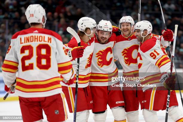 Jonathan Huberdeau of the Calgary Flames celebrates his power-play goal against the Seattle Kraken during the first period at Climate Pledge Arena on...