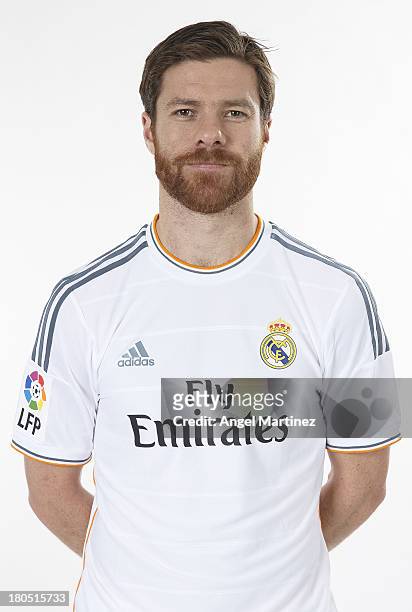 Xabi Alonso of Real Madrid poses during the official team photo session at Valdebebas training ground on September 13, 2013 in Madrid, Spain.