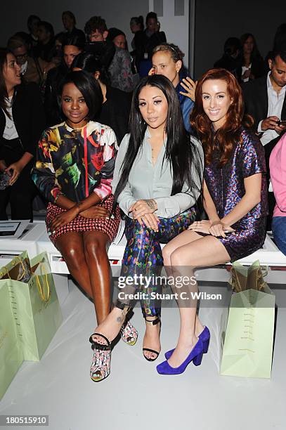 Singers Keisha Buchanan, Mutya Buena and Siobhan Donaghy attend the Sister By Sibling show during London Fashion Week SS14 at BFC Courtyard Showspace...