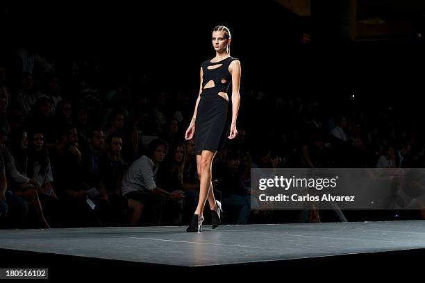 Model showcases designs by AA De Amaya Arzuaga on the runway at AA De Amaya Arzuaga show during Mercedes Benz Fashion Week Madrid Spring/Summer 2014...