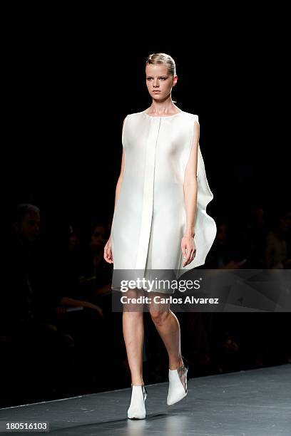 Model showcases designs by AA De Amaya Arzuaga on the runway at AA De Amaya Arzuaga show during Mercedes Benz Fashion Week Madrid Spring/Summer 2014...