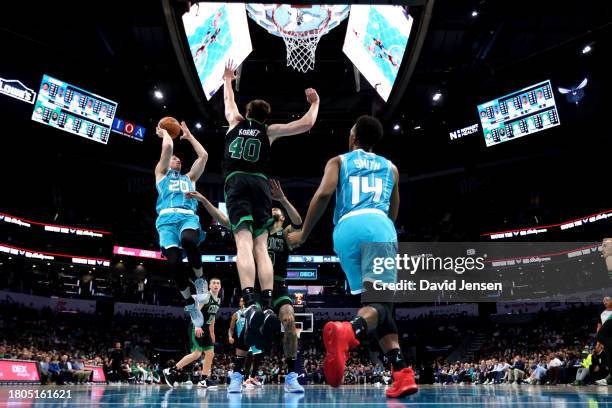 Gordon Hayward of the Charlotte Hornets shoots the ball during the first half of an NBA game against the Boston Celtics at Spectrum Center on...