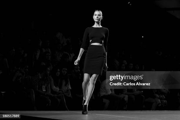 Model showcases designs by AA De Amaya Arzuaga on the runway at AA De Amaya Arzuaga show during Mercedes Benz Fashion Week Madrid Spring/Summer 2014...