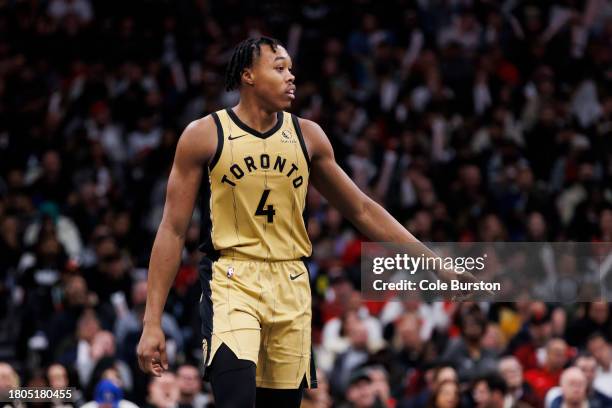 Scottie Barnes of the Toronto Raptors walks the court against the Boston Celtics during the second half of their NBA In-Season Tournament game at...