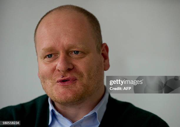 Bernd Schloemer, chairman of Germany's Pirate Party, talks with AFP journalists during an interview at the AFP office in Berlin on September 13,...