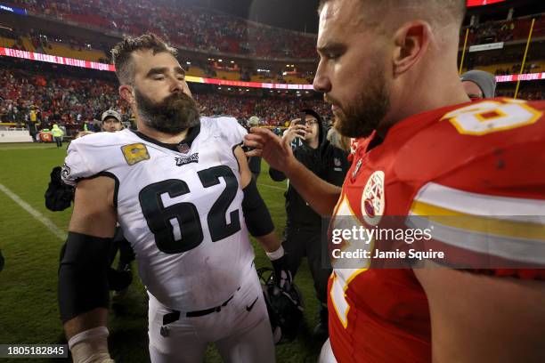 Jason Kelce of the Philadelphia Eagles talks to brother Travis Kelce of the Kansas City Chiefs after their game at GEHA Field at Arrowhead Stadium on...