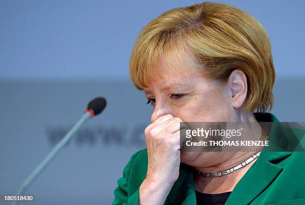 German Chancellor Angela Merkel gestures during a regional convention of her Christian Democratic Union party in Heilbronn, southwestern Germany, on...