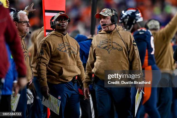 Head coach Sean Payton and defensive coordinator Vance Joseph of the Denver Broncos look on in the third quarter against the Minnesota Vikings at...