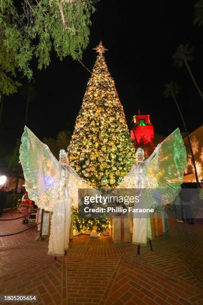 Snowflake stilt walkers are seen during the Los Angeles Union Station Tree Lighting Ceremony at Union Station on November 20, 2023 in Los Angeles,...