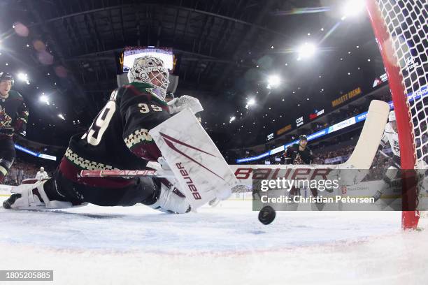 Anze Kopitar of the Los Angeles Kings scores a goal past Goaltender Connor Ingram of the Arizona Coyotes during the first period of the NHL game at...